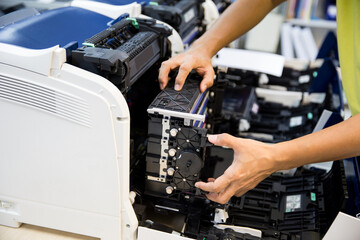Technician open cover printer for replace drum and fix repair problem ink cartridges in office...