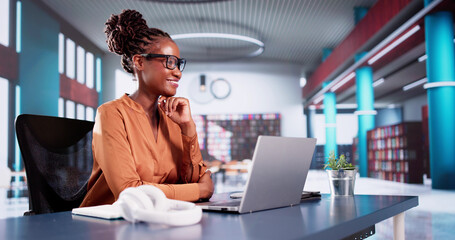Student College In School Campus Using Laptop