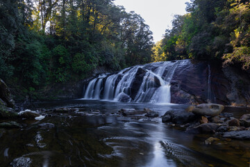 Obraz premium Beautiful morning light at Coal Creek Falls, Greymouth, New Zealand.