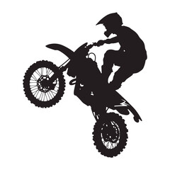 Fototapeta premium Silhouette of a motocross rider performing a stunt on a dirt bike.