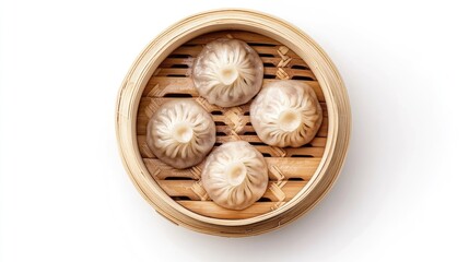 Steamed baozi dumplings with meat in a bamboo steamer, top view, isolated on a white background, showcasing traditional dim sum.