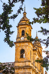 Historic Primada Cathedral Tower in Bogotá Against Blue Sky
