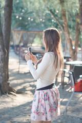 cute girl enjoying time outdoor at white sand beach