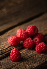 raspberries on wooden table