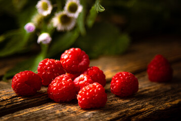 raspberries on a wooden table