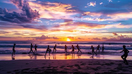 Sunset at a beach with a group of people playing beach rugby