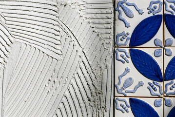 Lagos, Algarve, Faro district, Europe - Three dimentional Portuguese azulejos on adhesive cement, tiling works