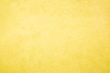 Yellow concrete stone texture for background in summer wallpaper. Cement and sand wall of tone vintage minimal. Concrete abstract wall of light yellow color, cement texture white blank for home decor.