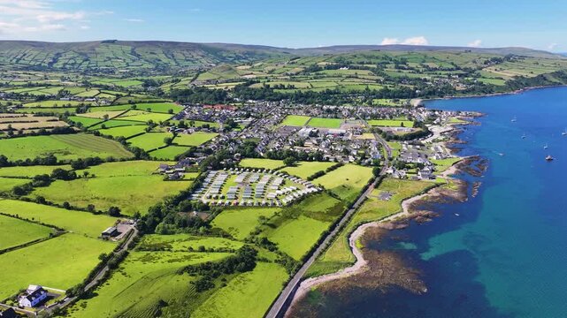 Aerial View of Cushendall Caravan Park and Lurig Caravan Club on the Irish Sea Cushendall Co Antrim Northern Ireland on a sunny day 27-07-24 