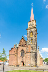 Obraz premium View at the Church of Saint Giles in the streets of Nymburk town in Czech Republic