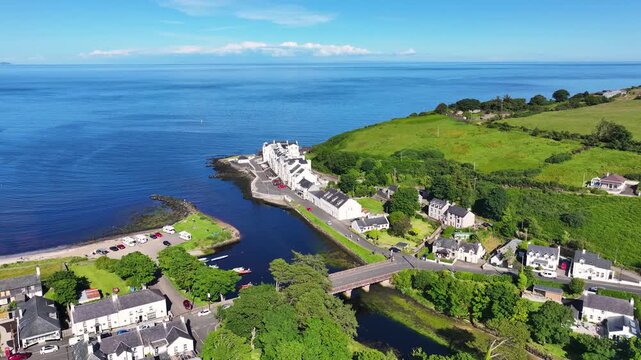 Aerial View of Glendun Cushendun on the Irish Sea Co Antrim Northern Ireland on a sunny day with a blue sky 