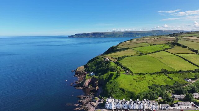 Aerial View of Glendun Cushendun on the Irish Sea Co Antrim Northern Ireland on a sunny day with a blue sky