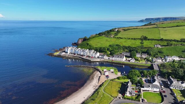 Aerial View of Glendun Cushendun on the Irish Sea Co Antrim Northern Ireland on a sunny day with a blue sky 
