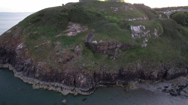 Aerial video over Castell Cricieth near Criccieth Beach Criccieth UK