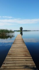 Fototapeta premium Wooden Dock Leading to a Small Island on a Still Lake.