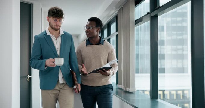 Coffee, document and business people walking in office together for team meeting. Collaboration, men and project proposal with research, discussion or conversation in workplace hallway during break