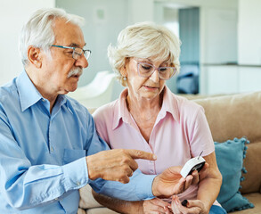 blood diabetes patient sugar medicine insulin test glucose glucometer woman man adult care blood sugar test couple illness senior diabetic level disease exam