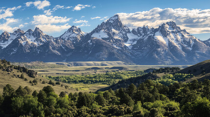 Fototapeta premium A stunning stock photo of a majestic mountain range with snow-capped peaks. The image captures the grandeur and natural beauty of the mountains.