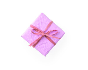 Top view of crumpled paper pink color present box with recycled paper ribbon isolated on white