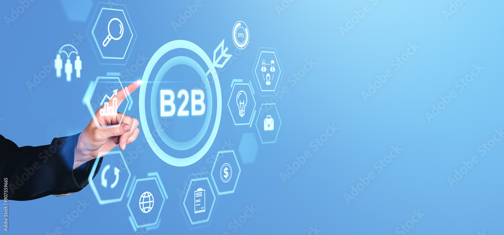 Aufkleber hand pointing at b2b icons on a digital interface with a blue background.