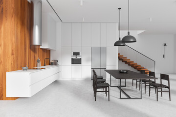 Modern home kitchen interior with dining table and chairs, cooking cabinet