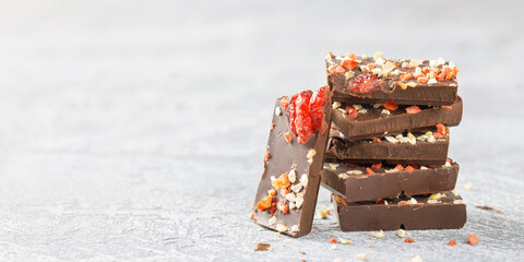 Chocolate with dried raspberries and nuts. Healthy sweets