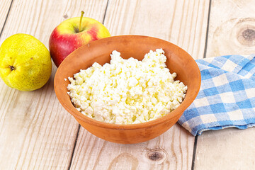 Organic cottage cheese in the bowl