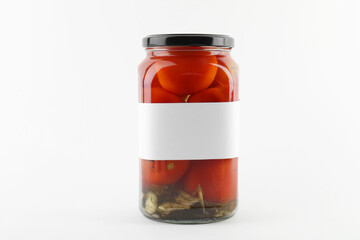 Tasty pickled tomatoes in jar on white background