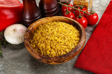 Dry wheat bulgur cereal heap