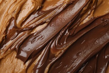 Tasty peanut butter as background, top view