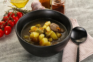 Soup with meatball and potato