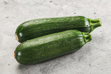 Raw green ripe zucchini vegetable