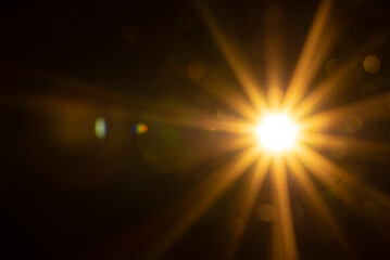 Sun flare on the black background