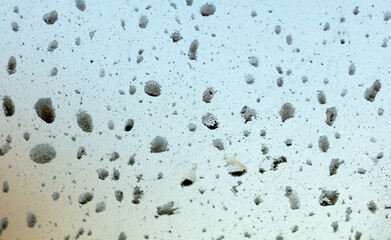 Dirt on the car glass. Abstract background