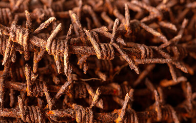 Close-up of rusty metal barbed wire