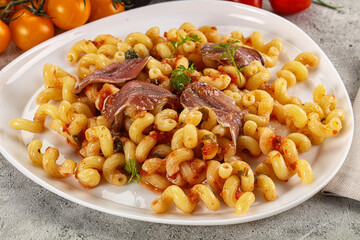 Italian pasta cellentani with anchovy