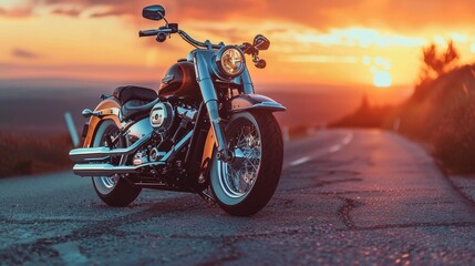 Obraz premium A sleek Harley-Davidson motorcycle parked on an open road at sunset, with the horizon stretching out behind it, showcasing its powerful and iconic design