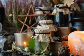 Potions in glass jars. Magic items scene. Witchcraft objects background.