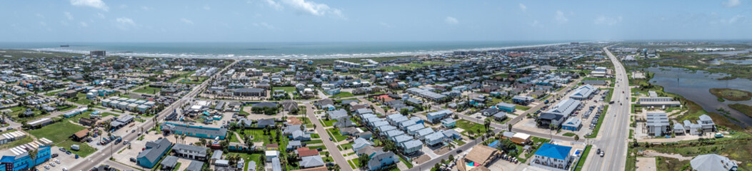Naklejka premium panoramic aerial landscape view of Port Aransas located on Mustang Island at Gulf of Mexico during a sunny day 