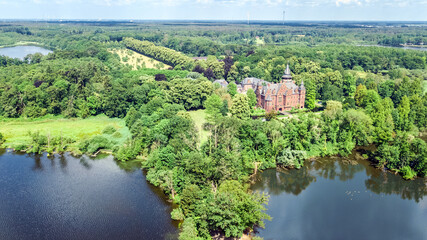Obraz premium Aerial drone view of Krickenbecker See lake and castle beautiful summer landscape from above, Germany