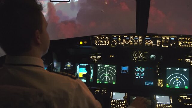 Focused pilot navigates aircraft with steering wheel turning thrust lever. Captain deftly flies airplane during lightning at night