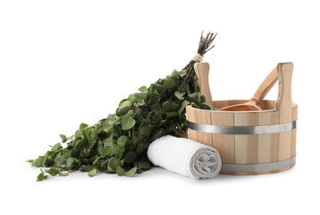 Sauna equipment. Wooden bucket with ladle, birch whisk and towel isolated on white