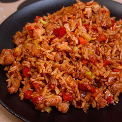 Appetizing, beautiful rice with chicken and tom yum on a lovely background