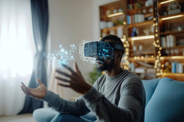African American man using a VR headset interacts with a virtual environment in his living room through advanced spatial computing technology.