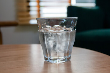 Drink and ice on the table in the coffee cafe.