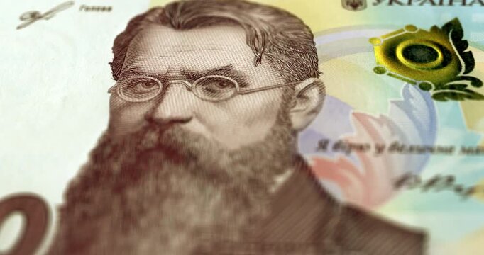 1000 ukrainian hryvnias banknote, macro tracking shot, camera moves along one thousand paper hryvnia, close up, footage