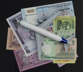 Toy Airplane on Assorted Bangladeshi Banknotes