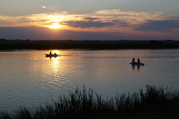 fishing at sunset