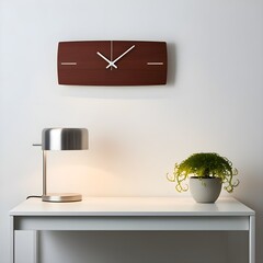 A simple wooden clock on the wall above an empty white desk, with a modern minimalist lamp and potted plant beside it.