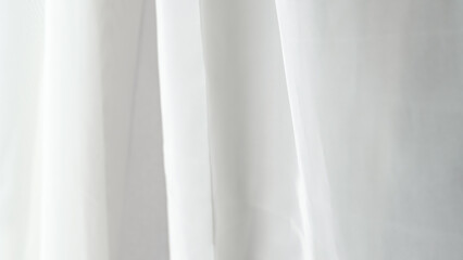 Elegant white fabric satin background, perfect for luxurious and smooth designs.